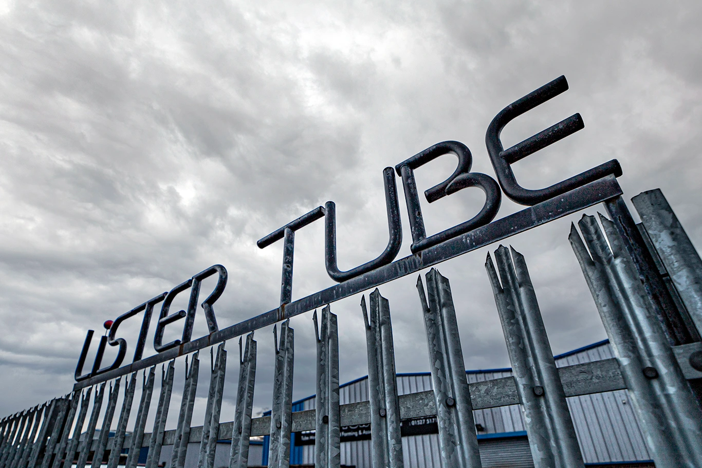 Lister Tube manufacturing facility with company signage on the building exterior